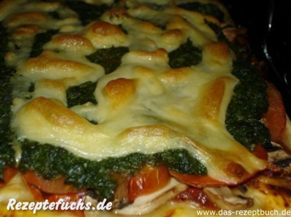 Pizza mit Spinat und Champignons